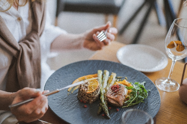 A person eating dinner