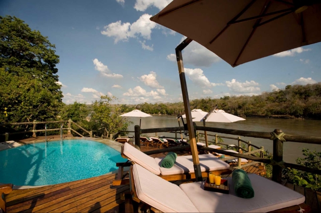 A swimming pool overlooking a lake