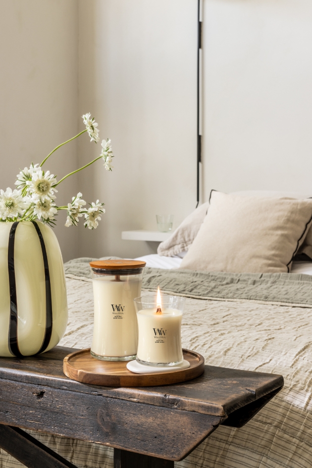 large and media candles in cream in bedroom