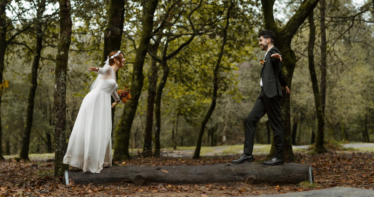 bride and groom on a log